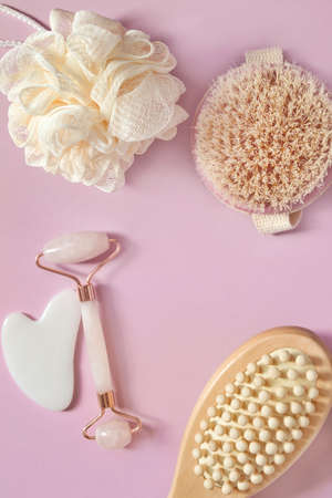 face and body care tools on pink backgroundの写真素材