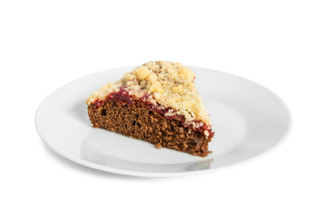 Piece of brownie crumble cake on white dish isolated on white backgroundの写真素材
