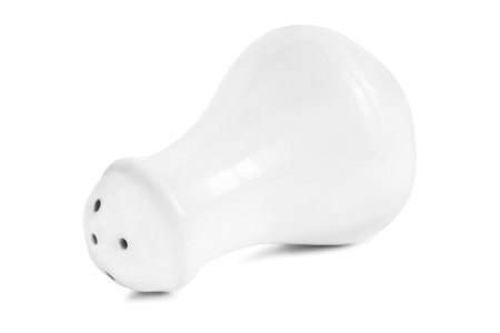 White ceramic salt shaker isolated on white backgroundの写真素材