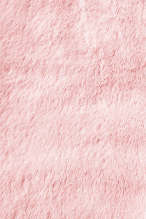 Light pink artificial fur blanket texture as a backgroundの写真素材