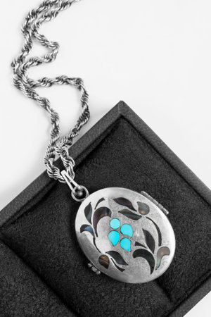 Vintage silver locket necklace in black jewel boxの写真素材