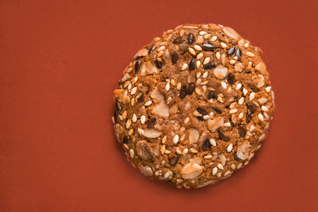 One grain homemade cookie on brown studio backgroundの写真素材
