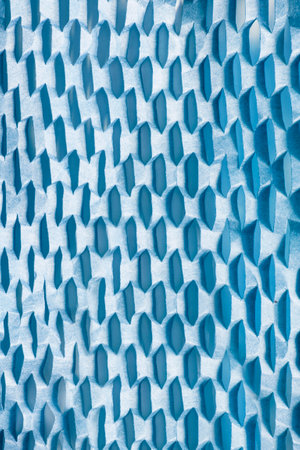Blue honeycomb packing paper texture closeup as a backgroundの写真素材