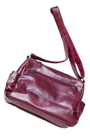 Maroon leather shoulder bag isolated on white backgroundの写真素材