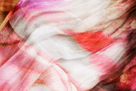 Abstract pastel color silk fabric closeup as a backgroundの写真素材