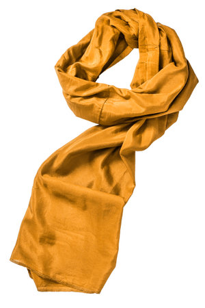 Yellow satin draped scarf isolated on white backgroundの写真素材
