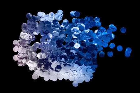 Blue and silver metallic confetti glitter isolated on black background