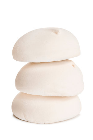 Three vanilla meringue cakes isolated on white backgroundの写真素材