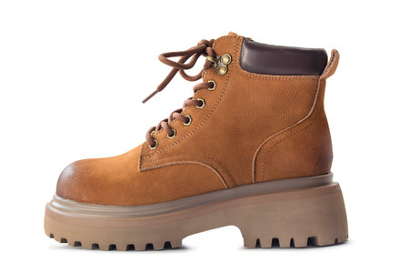 One brown leather hiking boot isolated on white background
