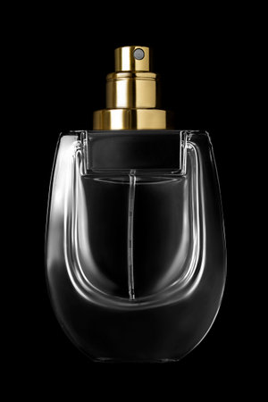Blank glass empty perfume spray bottle isolated on black backgroundの写真素材
