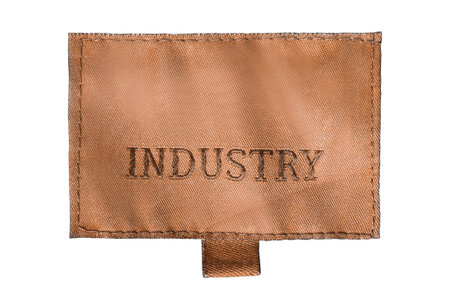 Brown clothes patch label says industry isolated on white background