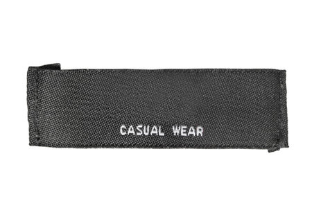 Fabric clothes label says casual wear isolated on white backgroundの写真素材