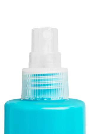 Plastic beauty product bottle spray closeup isolated over whiteの写真素材