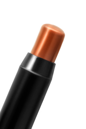 Makeup brown bronzer stick tube closeup isolated on white backgroundの写真素材