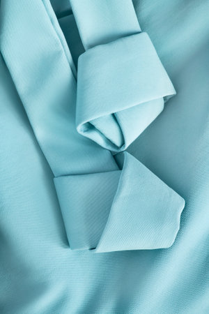 Light blue color fabric tied knot strap details closeup as a backgroundの写真素材