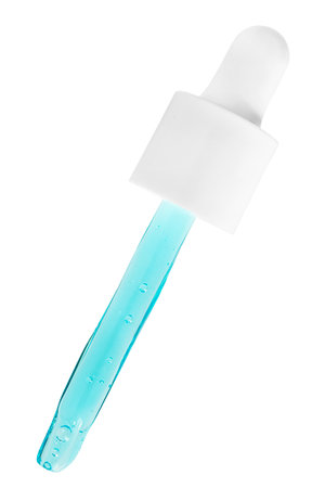 Pipette cap with blue product inside isolated on white backgroundの写真素材