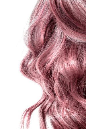 Strawberry blonde wavy beautiful hair closeup isolated over whiteの写真素材