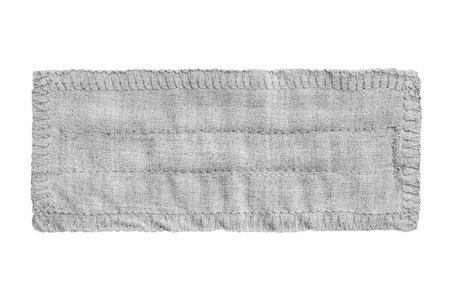 Gray linen fabric stitched patch isolated on white backgroundの写真素材