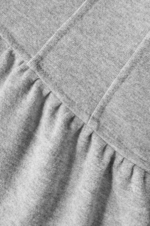 Gray knit fabric clothes details closeup as a backgroundの写真素材