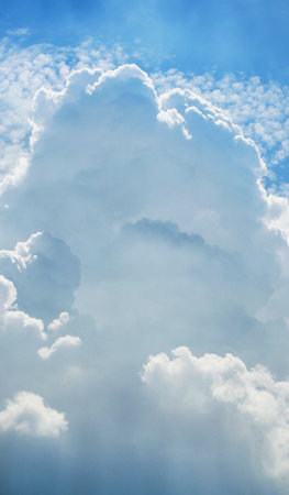 Large white cumulus fluffy cloud in the skyの写真素材