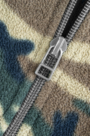 Unzipped military color fleece fabric closeup as a backgroundの写真素材