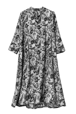 Black and white silk oversize boho style dress isolated on white backgroundの写真素材
