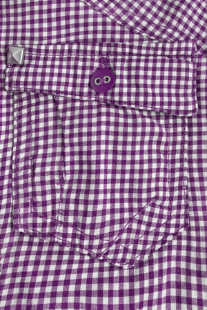 Purple plaid shirt flap patch pocket closeup as a backgroundの写真素材