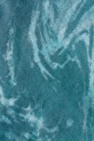 Abstract blue faded effect cotton fabric background closeupの写真素材