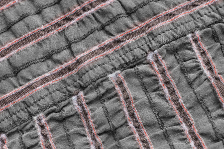 Striped gray cotton fabric closeup as a background