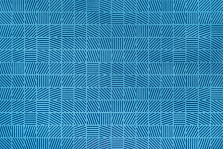 Blue ceramic floor tile texture closeup as a backgroundの写真素材