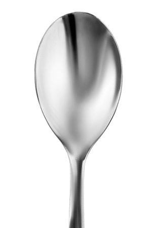 Clean stainless steel spoon closeup isolated over whiteの写真素材