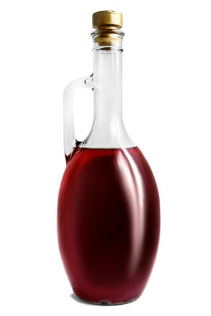 Red vine in glass decanter isolated on white backgroundの写真素材