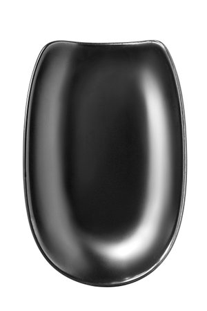 Black ceramic asymmetric dish isolated on white backgroundの写真素材