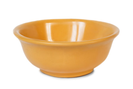 Brown empty ceramic bowl isolated on white backgroundの写真素材