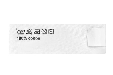 Fabric composition and care instructions label isolated on white background