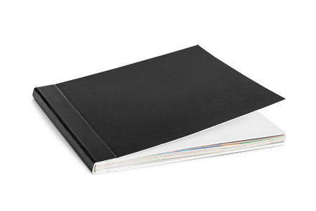 Black blank cover album lying isolated on white background