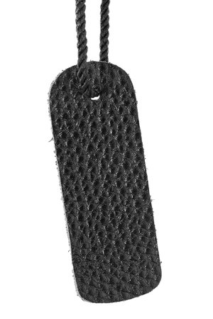 Black leather sample on a lace isolated on white backgroundの写真素材