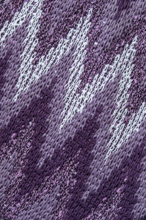 Purple abstract pattern knit fabric background closeupの写真素材