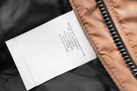 Washing instructions clothes label closeup as a backgroundの写真素材