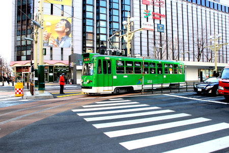 Tramway running in Sapporo on  public tram on the streetのeditorial素材