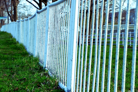 Strolling in the early spring of the Sapporo white fence with a viewの写真素材
