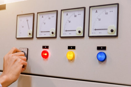 Engineer is check voltage or current by voltmeter in control panel of power plant and check system...