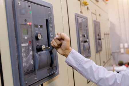 Engineer is check voltage or current by voltmeter in control panel of power plant. with checklist...