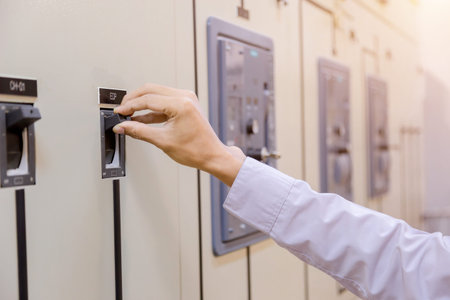 Engineer working on checking and maintenance electrical equipment engineer checking status...