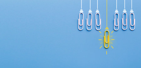 Great ideas concept with paperclip,thinking,creativity,light bulb on blue background,new ideas...