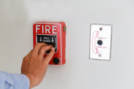 fire alarm box on cement wall for warning and security system.