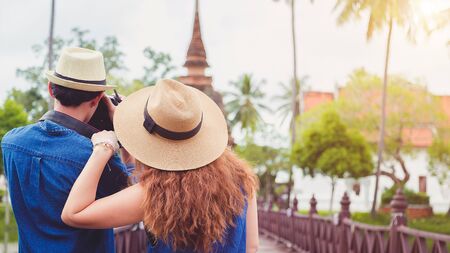 Young travelers are enjoying archaeological attractions. And enjoy digital photography.の写真素材