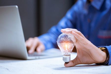 Business women holding light bulbs, ideas of new ideas with innovative technology and creativity.