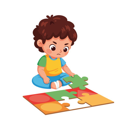 Cute little boy playing with puzzle.のイラスト素材