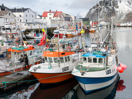 Fishing boats in Henningsvaer harbour on Austvagoy, Lofoten Islands, Norwayのeditorial素材
